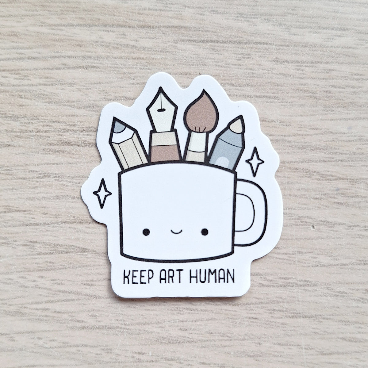 Keep art human sticker